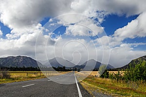 Straight empty road in the mountain, New Zealand