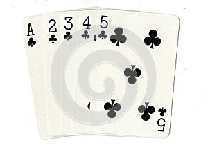 A straight flush of clubs poker hand of cards.