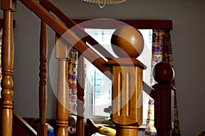 straight glued oak staircase. handrail made on a lathe. crenellated posts