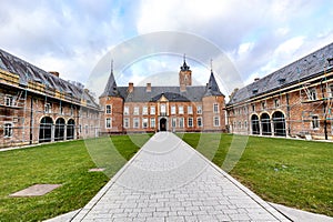 Straight path in outer courtyard in direction of Alden Biesen Castle