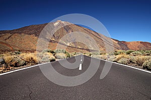 Straight road with El Teide in the background, Tenerife, Canary Islands.