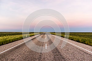 straight road through the outback of Australia, after a beautiful sunset, Nothern territory photo