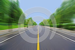 Straight road under blue sky