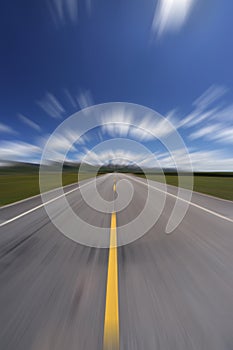 Straight road under blue sky