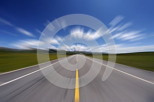 Straight road under blue sky