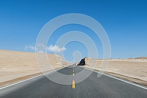 Straight road through the wind erosion landform