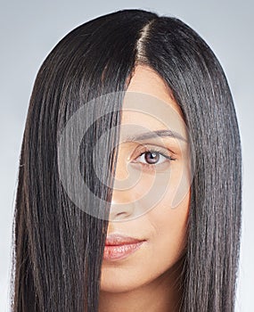 Straight, texture and portrait of woman with hair care from beauty or cosmetics on studio background. Model, head and