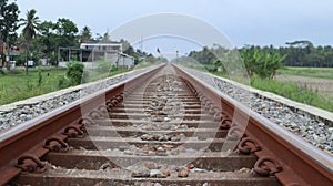 straight train tracks. horizontal iron. transportation. railroad gravel. view of the railroad. straight object.