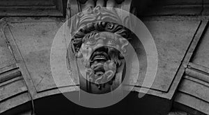 Strambotic face on the main arch of the facade photo