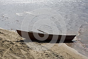 Stranded row-boat on a beach