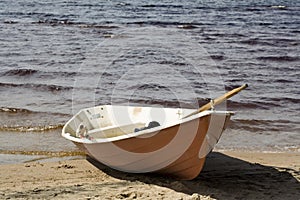 Stranded row-boat on a beach