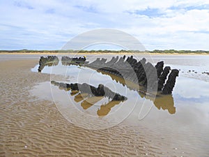 Stranded wreck of a wooden barque