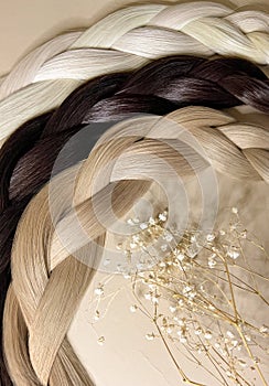 Strands of natural hair of different colors for extensions. Hair color palette