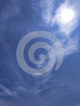 Strange alien shape cloud visible in the sunny daylight