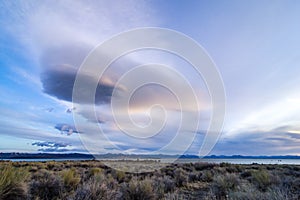 Strange clouds at Mono Lake with the Sierra Mountains in the distance at sunrise.