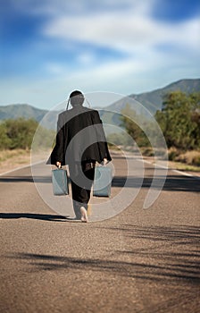 Strange indigenous man in the middle of a road