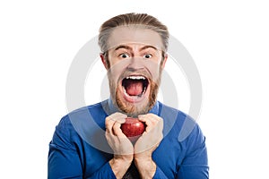 A strange office man with a big head offers an apple. transformed image.