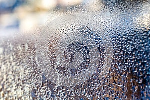 Strange patterns with drops on glass