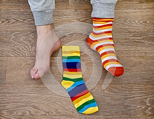Strange Socks Day. Lonely Sock Day. The social problem of bullying. Strange socks as a symbol of Down syndrome