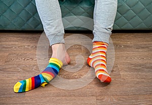 Strange Socks Day. Lonely Sock Day. The social problem of bullying. Strange socks as a symbol of Down syndrome