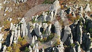 Strange stone formations on a hill. Shot. Aerial view.