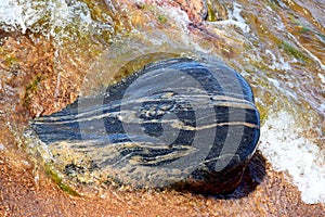 Strange stone made by erosion nature on the beach