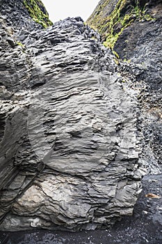 Strange stone structures on the black beach reynisfjara