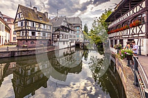 Traditional half-timbered houses on the picturesque canals of La Petite France in the medieval town of Strasbourg