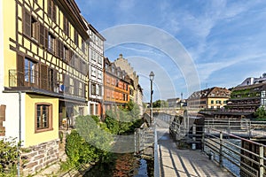 Traditional half-timbered houses on the picturesque canals of La Petite France in the medieval town of Strasbourg