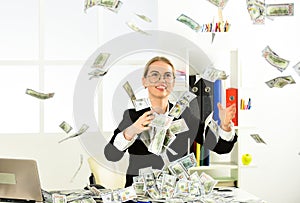 Strategies to Boost Your Income. Woman enjoy money falling from above. Passive income streams require an upfront photo