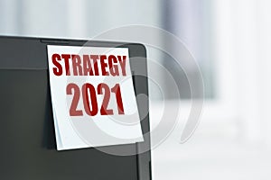 Strategy 2021 - text label on a computer monitor. A promising approach to achieve sustainable competitive advantage, search for