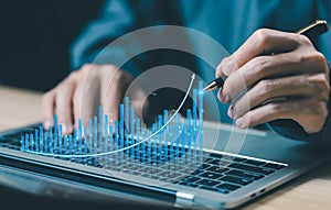 strategy analysis investor to invest has a graph chart of economic growth stock market and business. concept of rate exchange