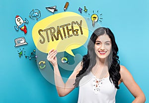 Strategy with woman holding a speech bubble