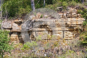 Stratified and cracked rock wall