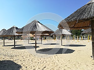 Straw beach umbrellas