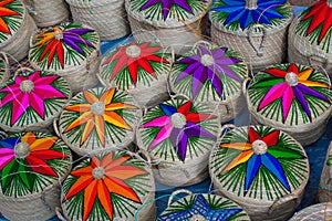 Straw boxes on the market in Chichicastenango photo