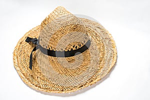 Straw hat with black ribbon