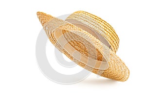 Straw hat flying isolated in studio. Concept of fashion clothing accessories and beach holidays