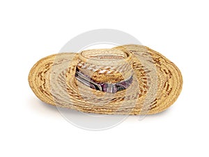 straw hat front view isolated on white background. Close up of wide brimmed straw hat from the French West Indies. Culture,