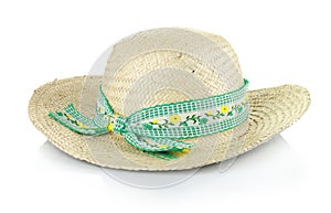 A straw hat with a green ribbon