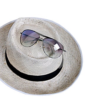 Straw hat and sun glasses