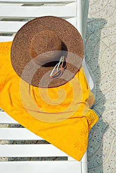 Straw hat with towel