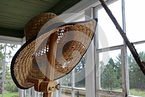 Straw hat on the veranda in the museum `Dacha of the artist Konstantin Korovin` in the village of Okhotino, Yaroslavl region