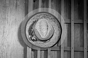 Straw hat on wooden background