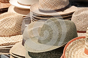 Straw hats for sale on a table