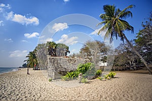 straw hut on the beach in Africa in the evening light. Beautiful seascape.