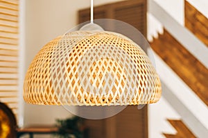 Straw lampshade in modern living room. Eco-friendly interior design