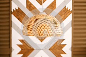 Straw lampshade in modern living room. Eco-friendly interior design using natural materials