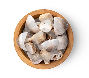 Straw mushroom in wood bowl isolated on white background