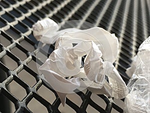 Straw Paper crinkled up on table